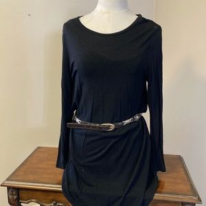 Brown leather belt with Southwestern silver metal designs, 39 inches long.